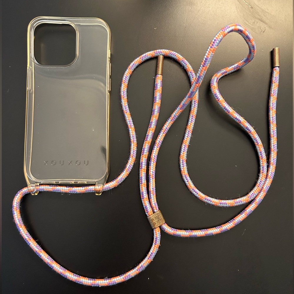 XOUXOU iPhone 14 Pro case with eyelets and strap